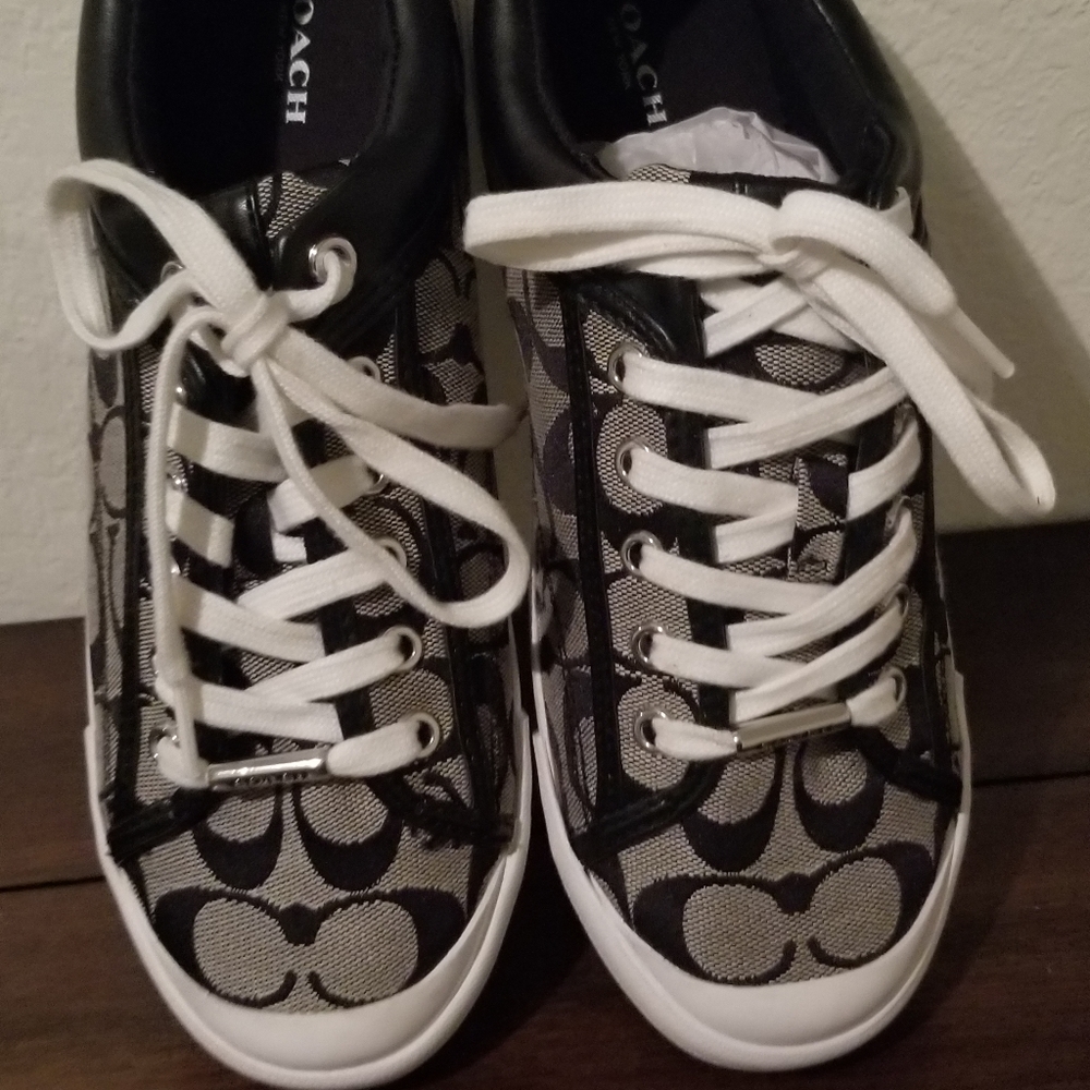 Authentic Coach Francesca sneaker.  Gently used.  Women's Size 9B.  Black/ White
